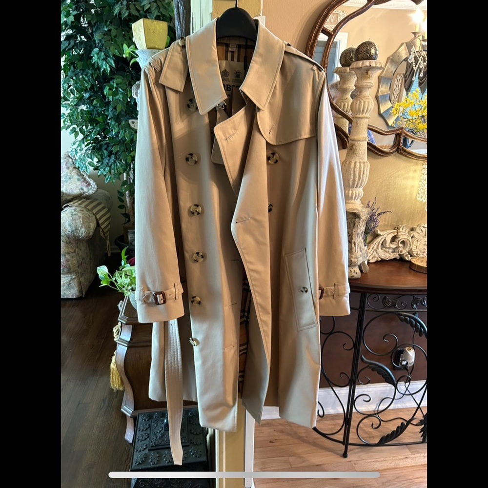 AUTHENTIC Burberry rain coat! Brand new! Never worn. Tags still on.